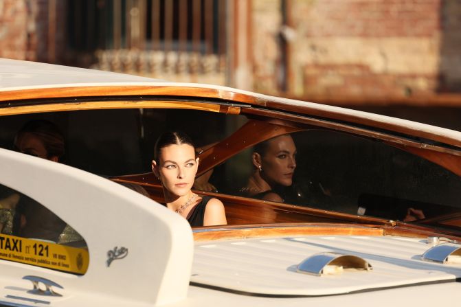 Model Vittoria Ceretti waits on a taxi boat before leaving for the wedding ceremony on Friday.