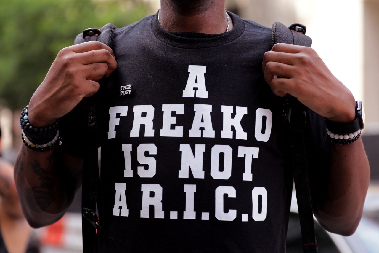 A person wears a shirt that says "A Freako is not a R.I.C.O" outside Manhattan's Federal Court on Wednesday.