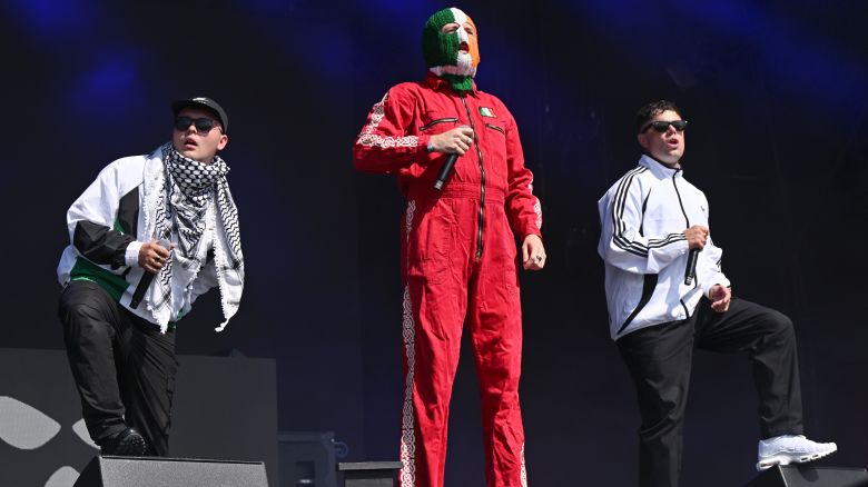 Irish-speaking rap group Kneecap performs at the Glastonbury Festival in the UK in June 2025. The trio was banned from Canada on Friday ahead of their October tour dates there.