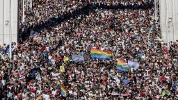BUDAPEST, HUNGARY - JUNE 28: Participants cross the  Elisabeth Bridge during the Budapest Pride on June 28, 2025 in Budapest, Hungary. Early in 2025, Hungary passed a law restricting the freedom of assembly by connecting it to a previous law from 2021 prohibiting the public portrayal to children of 'divergence from self-identity corresponding to sex at birth, sex change or homosexuality'. Consequently, events such as Pride marches are illegal in the country. The LGBTQ+ community are defying the ban and holding their Pride event on the streets of Budapest. (Photo by Janos Kummer/Getty Images)