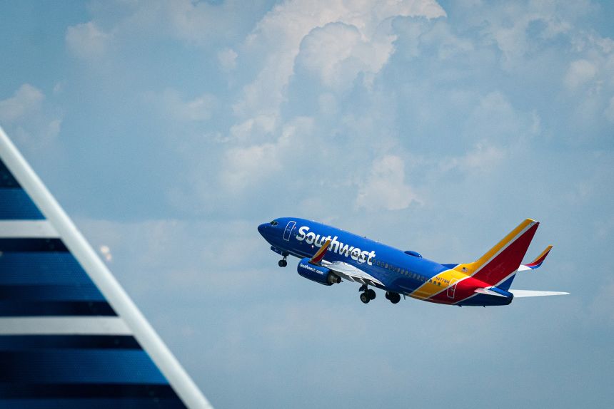 A Southwest Airlines Boeing 737-700 takes off from Ronald Reagan Washington National Airport in Arlington, Virginia.