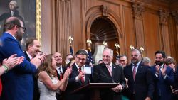 US Speaker of the House Mike Johnson (C) alonside US Republican lawmakers, shows the final tally of the vote on US President Donald Trump's tax bill, One, Big, Beautiful Bill Act during a press conference US Capitol in Washington, DC, on July 3, 2025. Congress passed the 