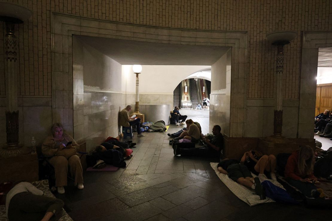 People take shelter overnight in an underground subway station during missile strikes in Kyiv on July 4, 2025.