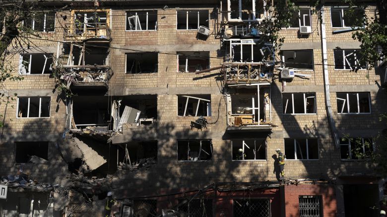 Ukrainian rescuers work in a damaged residential building following mass Russian drone and missile strikes on Ukraine's capital Kyiv on July 4, 2025, amid the Russian invasion of Ukraine. Kyiv said on July 4 that Russia had launched its largest overnight aerial attack on Ukraine over the more than three-year invasion. A representative of Ukraine's air force Yuriy Ignat said the barrage of 550 drones and missiles was a record, adding "this is the largest number that the enemy has used in a single attack."