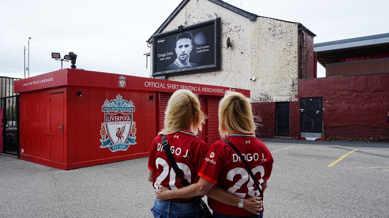 Liverpool supporters wearing shirts in memory of Diogo Jota at Anfield Stadium, home of Liverpool, who has died at the age of 28. The Portugal forward died along with his younger brother Andre Silva in the accident in Zamora on Thursday morning. Picture date: Friday July 4, 2025. (Photo by Peter Byrne/PA Images via Getty Images)