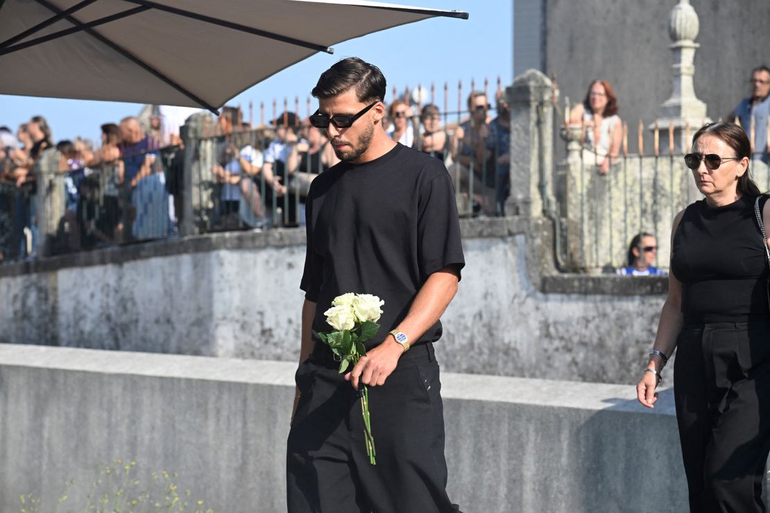 Manchester City and Portugal star Rúben Dias was pictured arriving at the funeral.