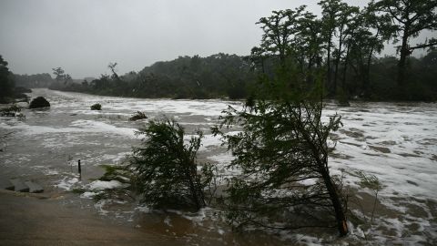 Torrential rains caused a "catastrophic" flash flood that killed dozens of people as it swept through south-central Texas.