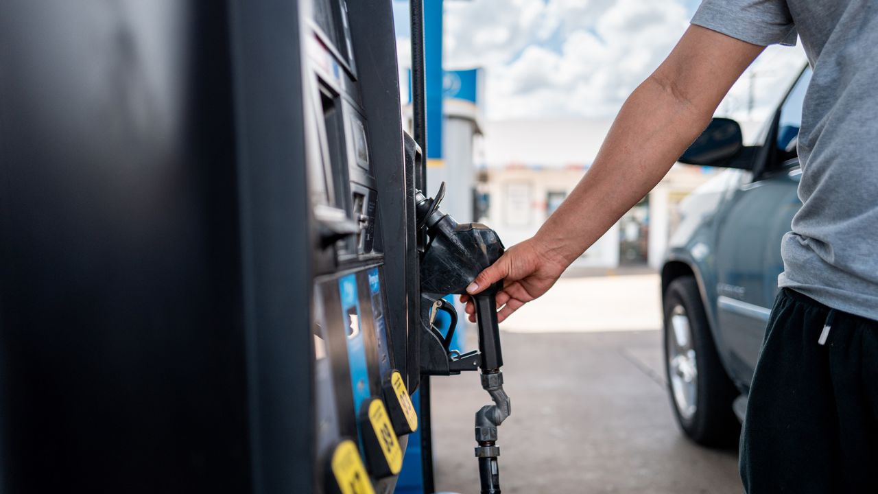 A person pumps gas at a Valero gas station on June 30, 2025 in Austin, Texas.