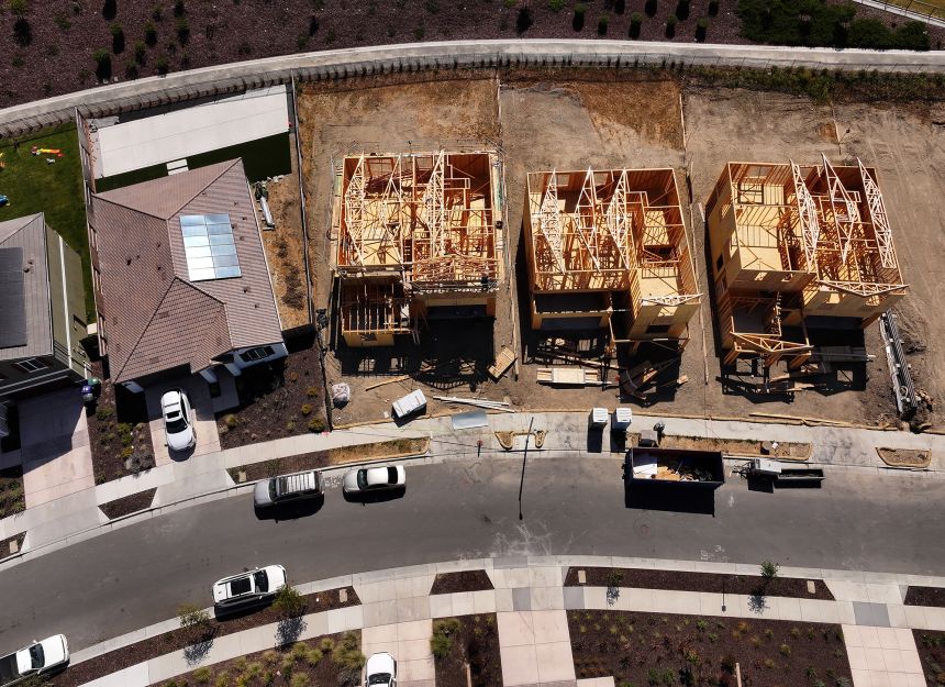 In an aerial view, homes are seen under construction at a new housing development on July 1, 2025 in Richmond, California.