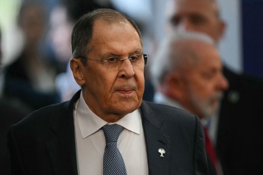 Russia's Foreign Minister Sergey Lavrov arrives at the first plenary session of the BRICS summit in Rio de Janeiro, Brazil, on July 6, 2025.