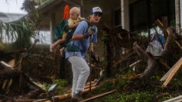 HUNT, TEXAS - JULY 6: A search and rescue worker looks through debris for any survivors or remains of people swept up in the flash flooding on July 6, 2025 in Hunt, Texas. Heavy rainfall caused flooding along the Guadalupe River in central Texas with multiple fatalities reported. (Photo by Jim Vondruska/Getty Images)