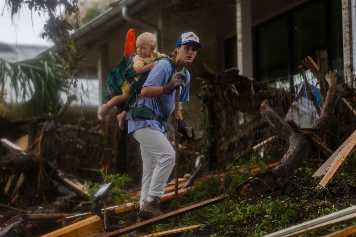 A search-and-rescue worker looks through debris in Hunt on Sunday.