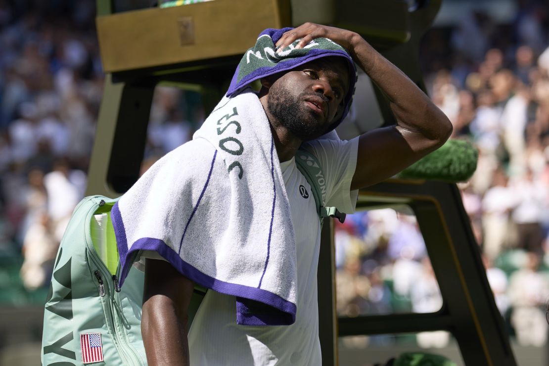 Frances Tiafoe leaves the court after his defeat against Cameron Norrie.