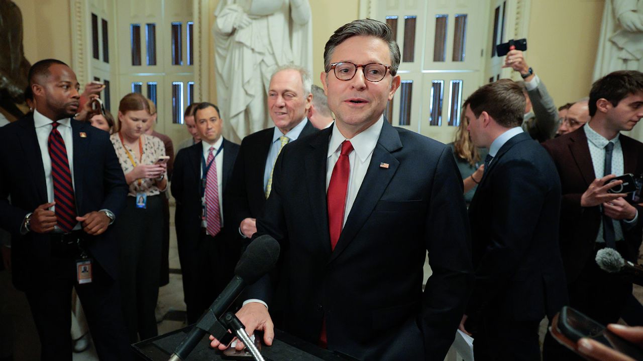 Speaker of the House Mike Johnson talks with reporters before heading to the House Chamber for a procedural vote on Tuesday.