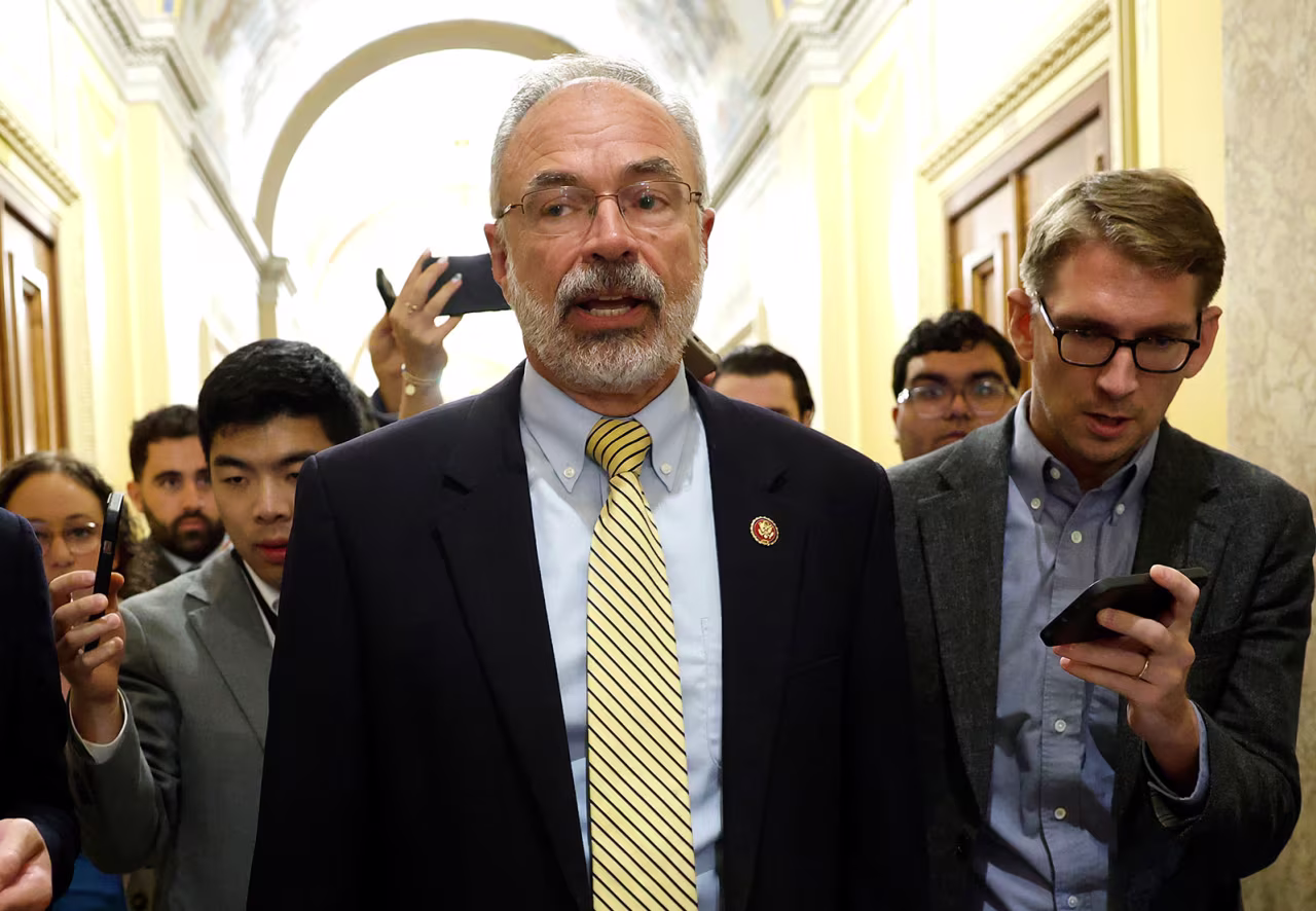 Freedom Caucus Chair Rep. Andy Harris talks to reporters as he walks to the House Chamber on Wednesday.