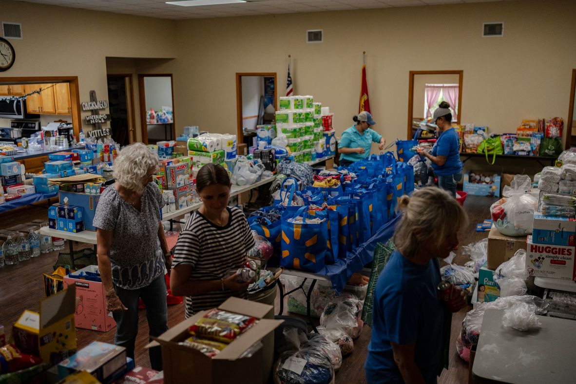 Food and other supplies for flood victims are collected at the Hunt Baptist Church on Sunday.