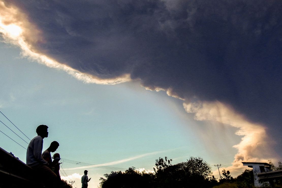 The eruption has sent volcanic materials as high as 18 kilometers (11 miles) into the sky, depositing ash on villages.