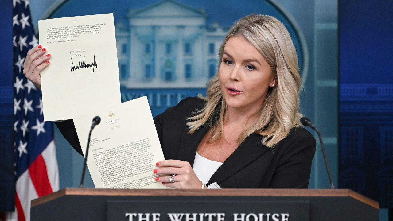 White House Press Secretary Karoline Leavitt holds a letter from US President Donald Trump addressed to South Korean President Lee Jae-myung as she speaks during the daily briefing in the Brady Briefing Room of the White House in Washington, DC, on July 7, 2025. US President Donald Trump said Monday he was slapping 25 percent tariffs on Japan and South Korea, in his first letters to trading partners ahead of a deadline to reach a deal with Washington. Trump had said at the weekend that starting from Monday he would send a first batch of up to 15 letters to countries informing them that he would reimpose harsh levies that he had postponed in April. In near-identically worded letters to the Japanese and South Korean leaders, Trump said the tariffs would apply from August 1 because their trading relationships with Washington were "unfortunately, far from Reciprocal."