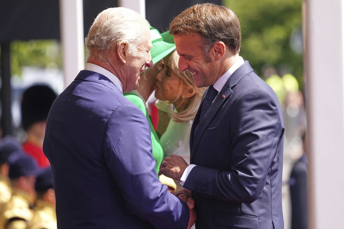 The King greets Macron on the first day of his state visit to the UK. The French president and his wife will stay at Windsor Castle on Tuesday, where a banquet will be held in their honor.