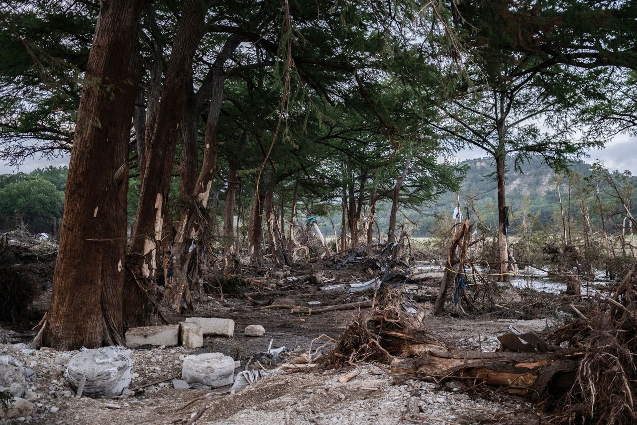 Debris lays along the Guadalupe River on Tuesday after it was swept up in the flash flooding in Ingram, Texas.
