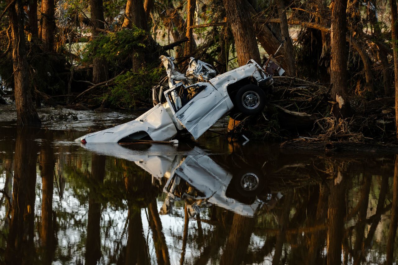 Debris sits along the Guadalupe River in Ingram, Texas, on Tuesday