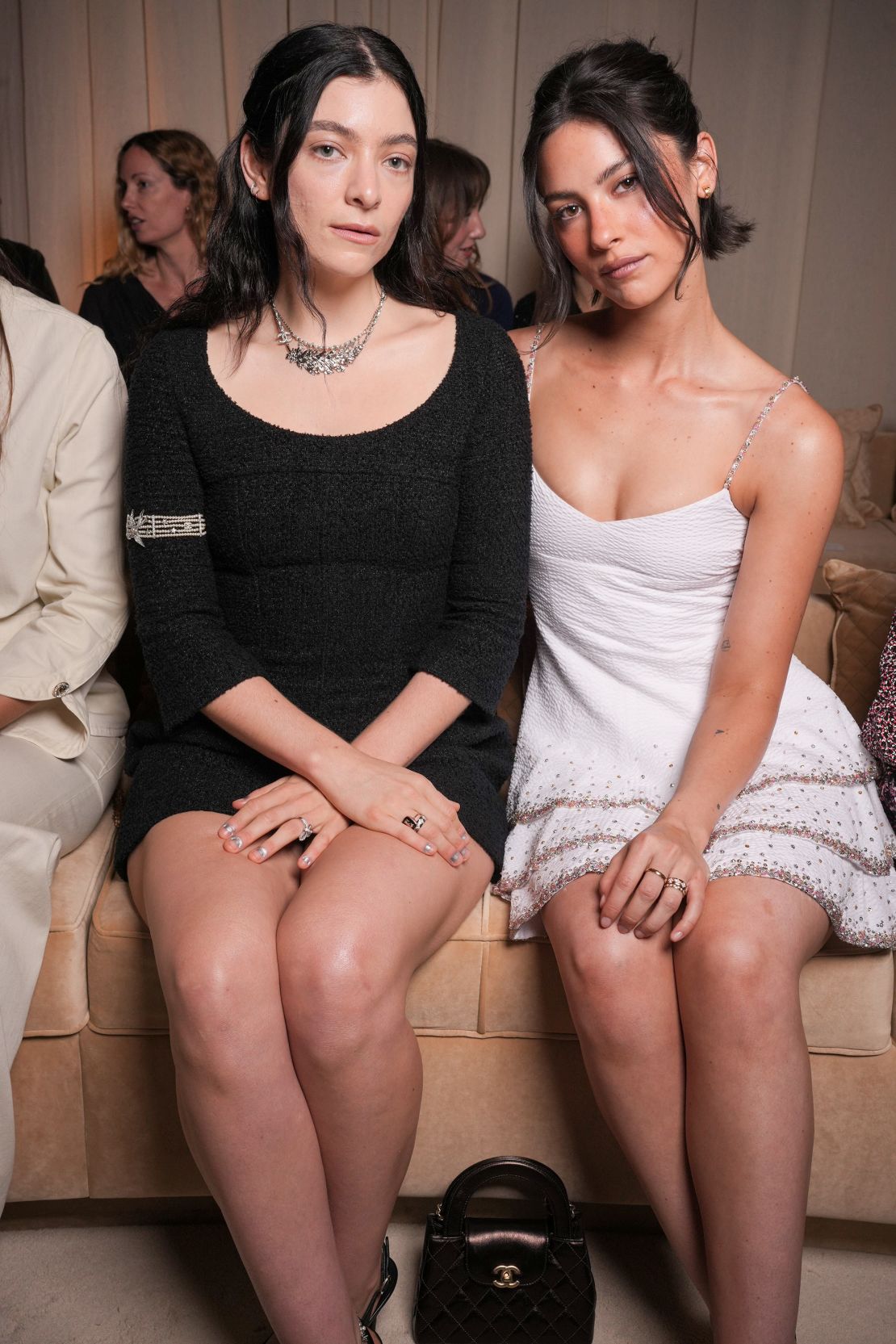 Lorde and Gracie Abrams on the front row of Chanel's fall 2025 Haute Couture show in Paris.