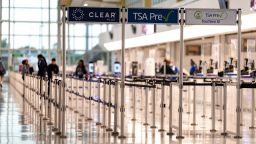 ARLINGTON, VA - JULY 8: The North Transportation Security Administration security checkpoint at Ronald Reagan Washington National Airport is seen on July 8, 2025 in Arlington, VA. For the first time in nearly two decades, the TSA is easing its shoe removal rule introduced five years after a 2001 shoe-bombing attempt by allowing some travelers to keep their shoes on at security checkpoints.(Photo by Kent Nishimura/Getty Images)