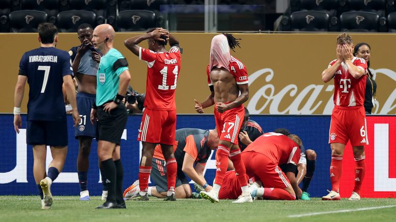 ATLANTA, GEORGIA - JULY 05: Players of FC Bayern Munchen react after Jamal Musiala #42 is injured during the FIFA Club World Cup 2025 quarter-final match between Paris Saint-Germain and FC Bayern München at Mercedes-Benz Stadium on July 05, 2025 in Atlanta, Georgia. (Photo by Alex Grimm/Getty Images)