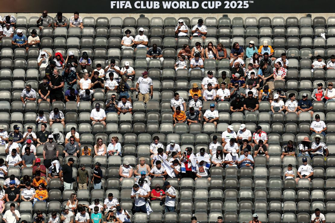 Fans looks on from the stands prior to the match between Real Madrid and Borussia Dortmund. While the game was well-attended, some matches at the tournament have seen sparse crowds.