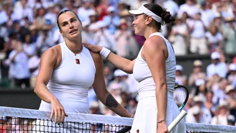 Winner US player Amanda Anisimova (R) congratulates to Belarus's Aryna Sabalenka (L) at the end of their women's singles semi-final tennis match on the eleventh day of the 2025 Wimbledon Championships at The All England Lawn Tennis and Croquet Club in Wimbledon, southwest London, on July 10, 2025. (Photo by Kirill KUDRYAVTSEV / AFP) / RESTRICTED TO EDITORIAL USE (Photo by KIRILL KUDRYAVTSEV/AFP via Getty Images)          