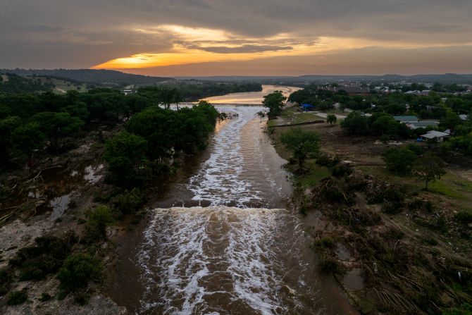 The sun sets over the Guadalupe River in Kerrville on Sunday.