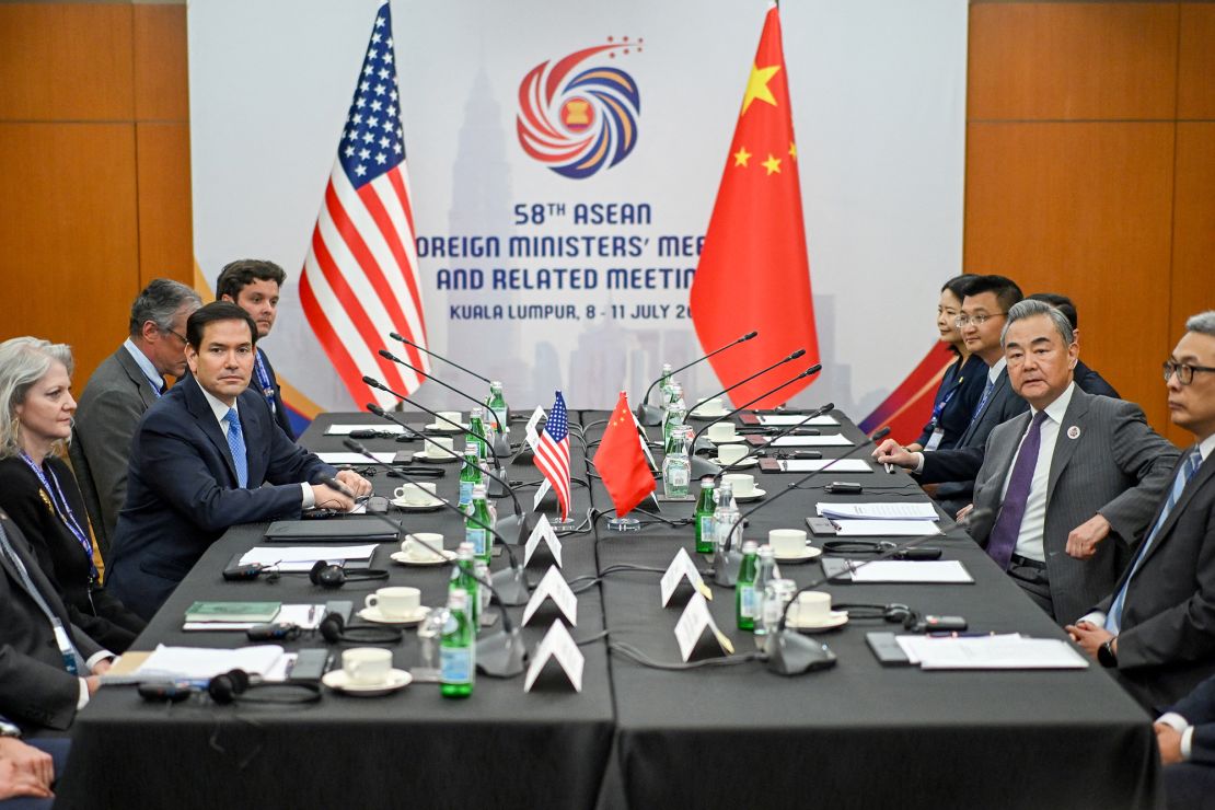 US Secretary of State Marco Rubio (2nd L) meets with China's Foreign Minister Wang Yi (2nd R) during the 58th ASEAN Foreign Ministers' meeting and related meetings in Kuala Lumpur on July 11, 2025.