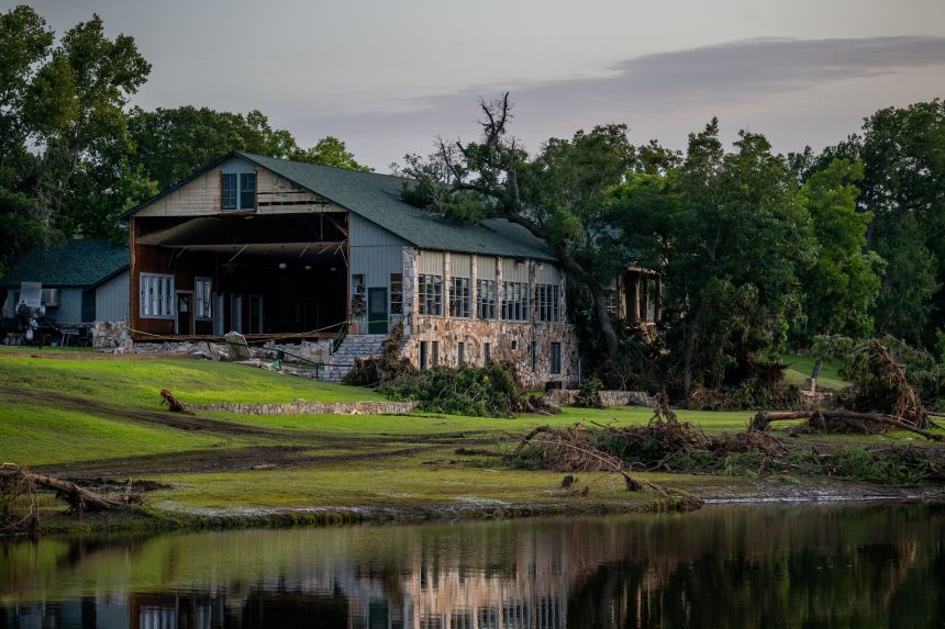 Caution tape covers the entrance of Camp Mystic in Texas on July 7, days after the deadly Fourth of July flooding.