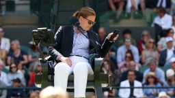 LONDON, ENGLAND - JULY 08: Chair umpire Louise Azemar-Engzell uses the telephone during the Gentleman's Singles Quarter Final match between Taylor Fritz of United States and Karen Khachanov on day nine of The Championships Wimbledon 2025 at All England Lawn Tennis and Croquet Club on July 08, 2025 in London, England. (Photo by Clive Brunskill/Getty Images)