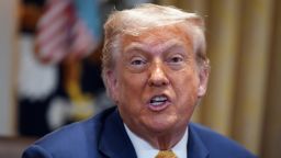 President Donald Trump speaks to members of the press during a Cabinet Meeting at the White House on July 8.