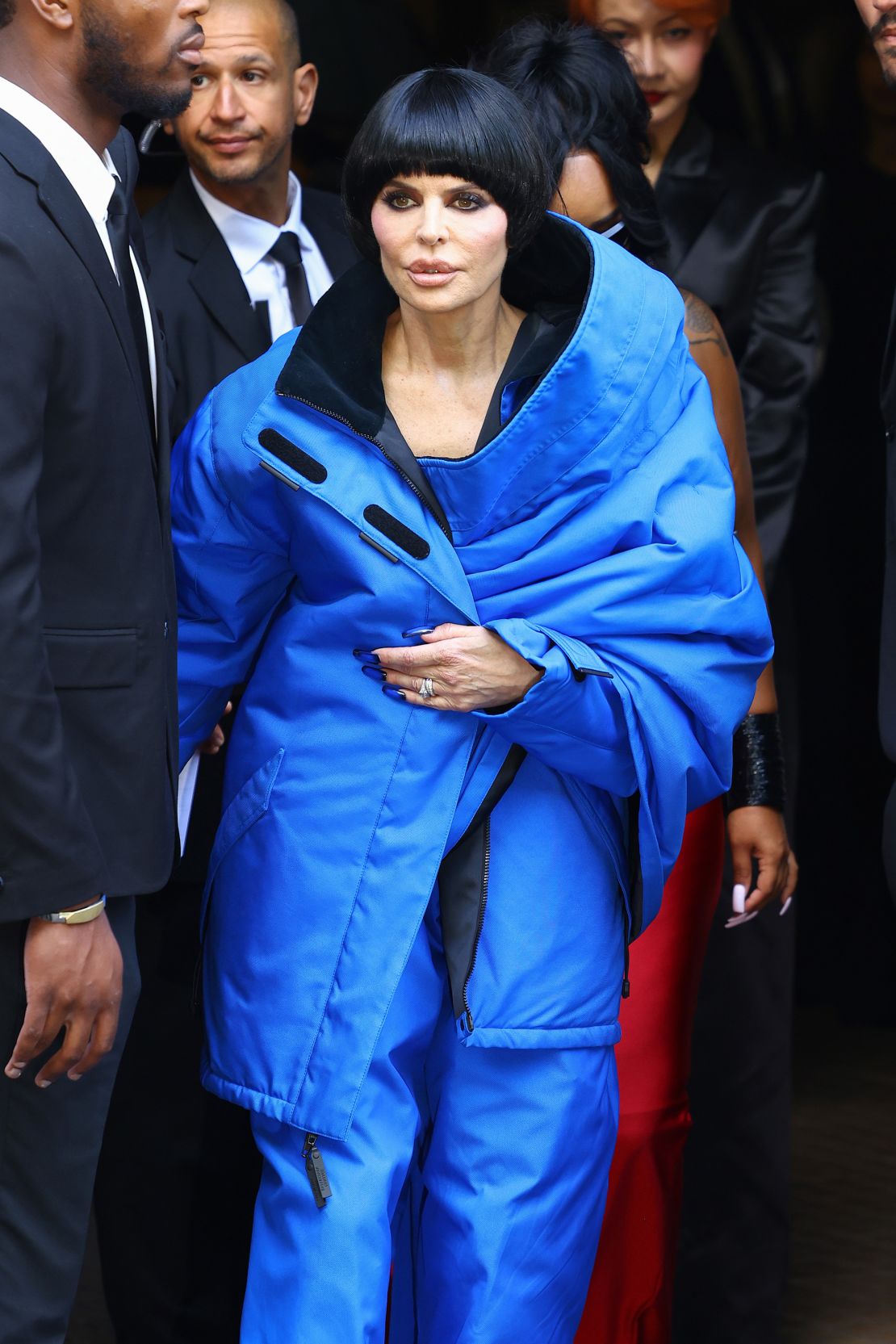 Earlier that day, Rinna was spotted in another bowl-cut wig for the Balenciaga couture show.