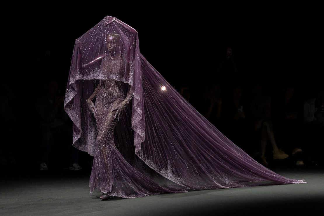 One of Robert Wun's most memorable looks was a celestial embroidered gown complete with two extra fake arms for an otherworldly silhouette.