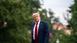 US President Donald Trump walks on the South Lawn of the White House after arriving on Marine One in Washington, DC, US, on Sunday, July 13, 2025.