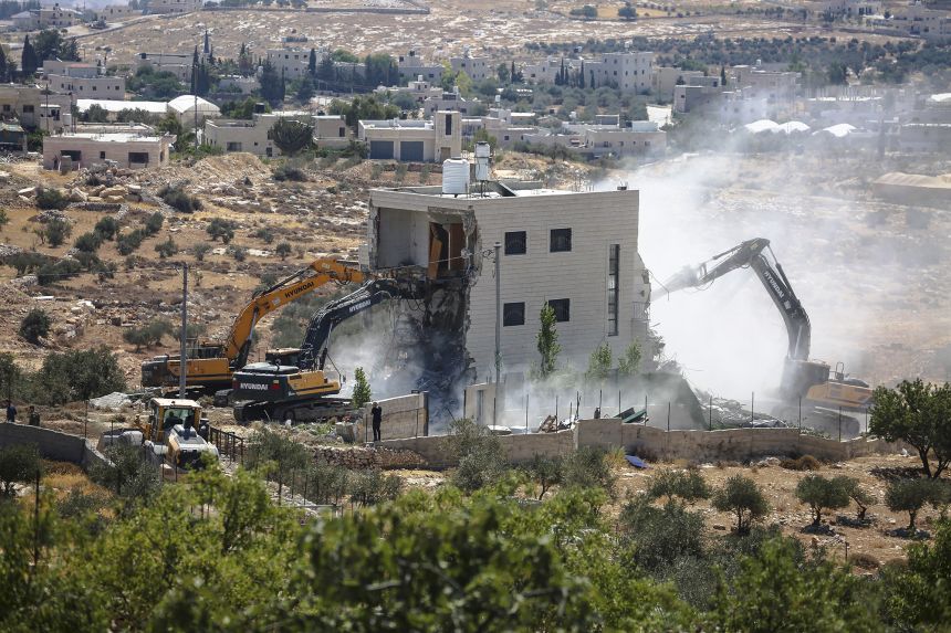 Israeli bulldozers will destroy a Palestinian home in the village of Maramaala, south of Bethlehem on the occupied west bank, on July 13, 2025.