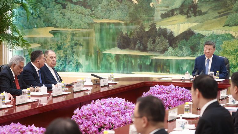 Chinese leader Xi Jinping welcomes foreign ministers from the Shanghai Cooperation Organization member states in Beijing's Great Hall of the People on Tuesday.