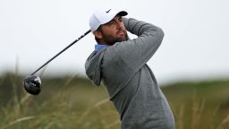 US golfer Scottie Scheffler watches his drive from the 8th tee during practice ahead of the 153rd Open Championship at Royal Portrush golf club in Northern Ireland on July 15, 2025. (Photo by HENRY NICHOLLS / AFP) / RESTRICTED TO EDITORIAL USE (Photo by HENRY NICHOLLS/AFP via Getty Images)          