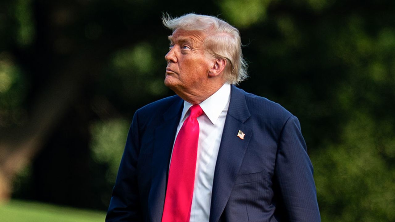 US President Donald Trump walks on the South Lawn of the White House after arriving on Marine One in Washington, DC, US, on Tuesday, July 15, 2025. Trump hailed more than $92 billion in investments in artificial intelligence and energy infrastructure during a visit to Pennsylvania, highlighting his efforts to bolster US competitiveness in the AI field. Photographer: Al Drago/Bloomberg via Getty Images