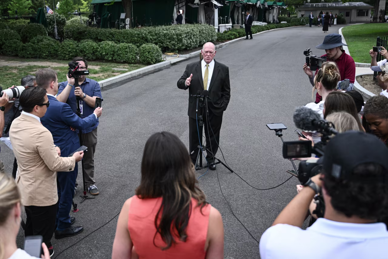 Trump border czar Tom Homan speaks to reporters outside the White House on Friday.