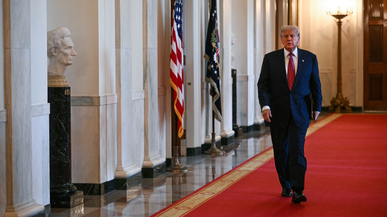 US President Donald Trump arrives to sign the GENIUS Act at the White House in Washington, DC, on July 18, 2025.
