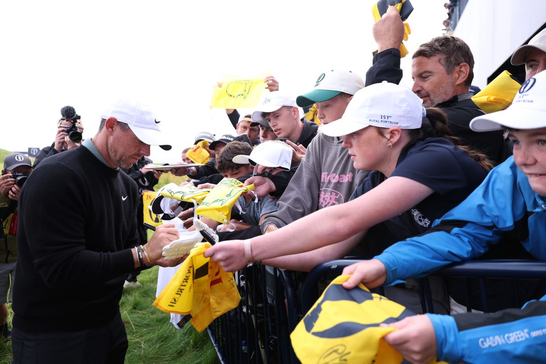 McIlroy signs autographs for fans during a practice round for the Open Championship at Royal Portrush Golf Club on July 15.