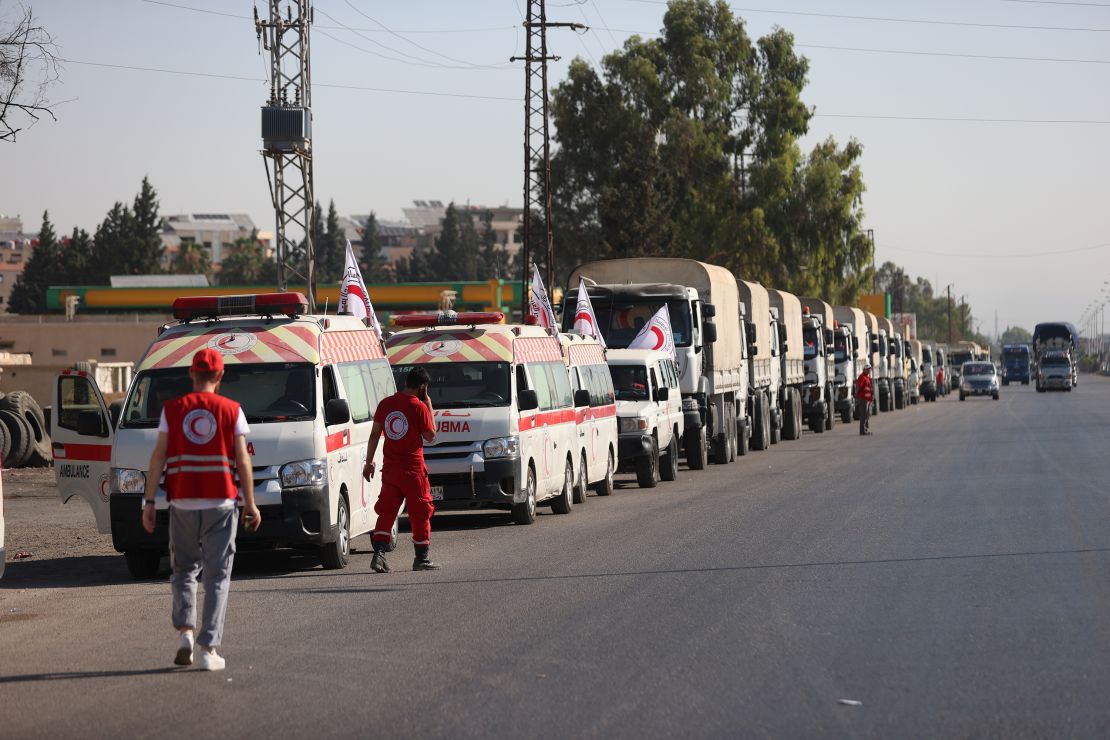 Syrian Arab Red Crescent vehicles on the outskirts of Suwayda, Syria on Sunday.