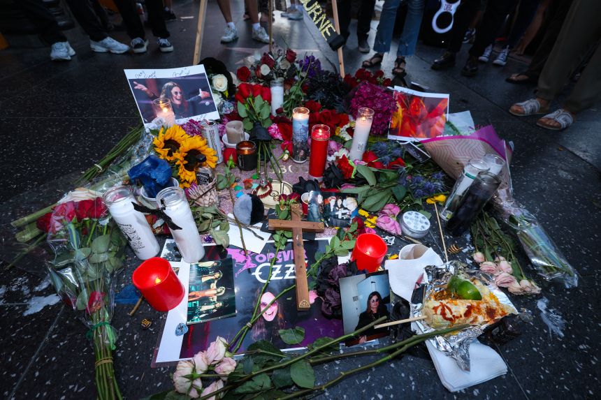 Flowers, candles and photos were left on Osbourne's Hollywood Walk of Fame star, too.