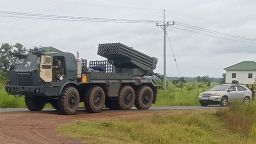 A Cambodian BM-21 multiple rocket launcher returns from the Cambodia-Thai border as Cambodian and Thai troops exchanged fire in a new round of clashes in Preah Vihear province on July 24, 2025.