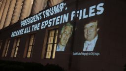 WASHINGTON, DC - JULY 18: An image of U.S. President Donald Trump and Jeffrey Epstein, along with the words “President Trump: Release All the Epstein Files”, is projected onto the U.S. Department of Commerce headquarters on July 18, 2025, in Washington, D.C. Earlier today, the Department of Justice asked federal judges to unseal files in the criminal cases of Jeffrey Epstein and Ghislaine Maxwell. (Photo by Anna Moneymaker/Getty Images)