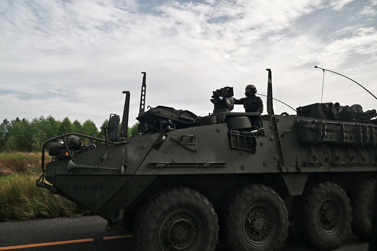 Royal Thai Army soldiers ride on an armored vehicle in Chachoengsao province, Thailand on Thursday.
